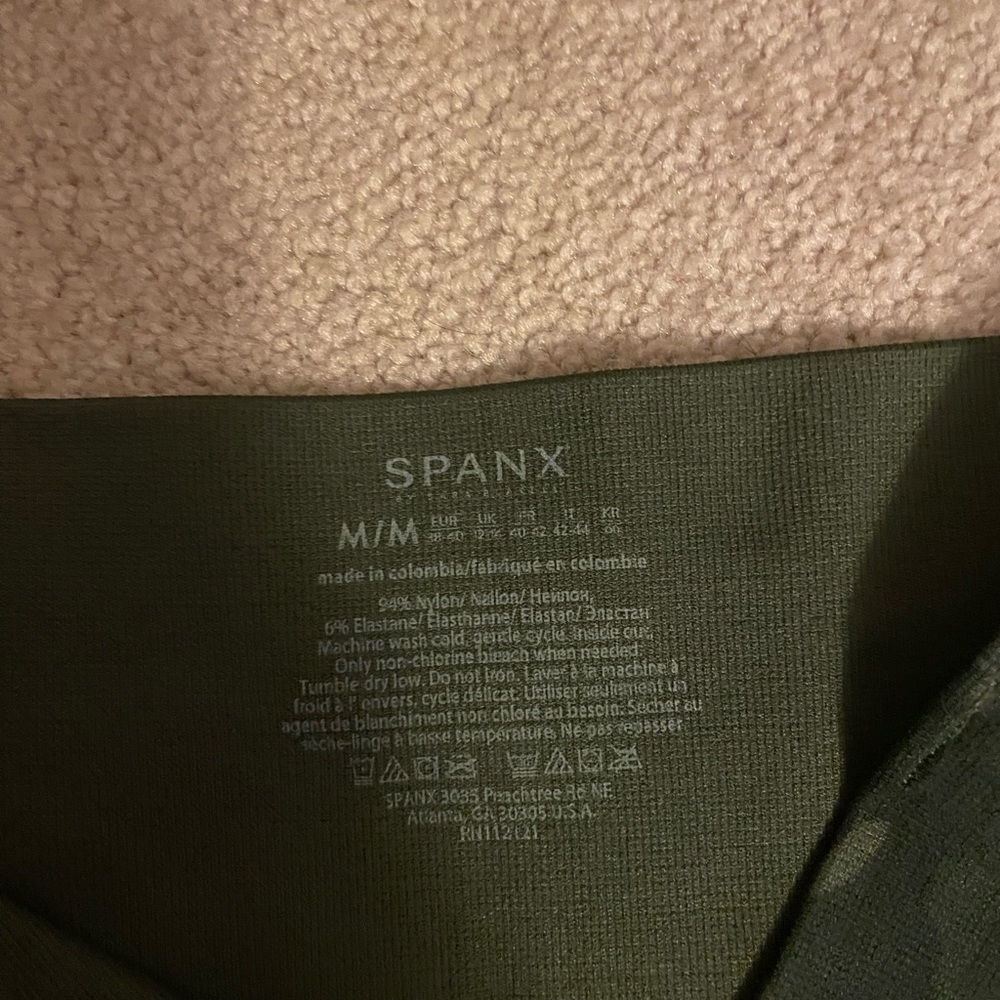 Spanx green camo leggings, size medium